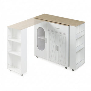 Kuchyňský ostrůvek na kolečkách s otočnou pracovní deskou Kudebola 115x40x94 cm dubový dekor/bílá [en.casa]
